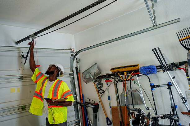 Professional Garage Door Panel Replacement technician working in Perry, OK
